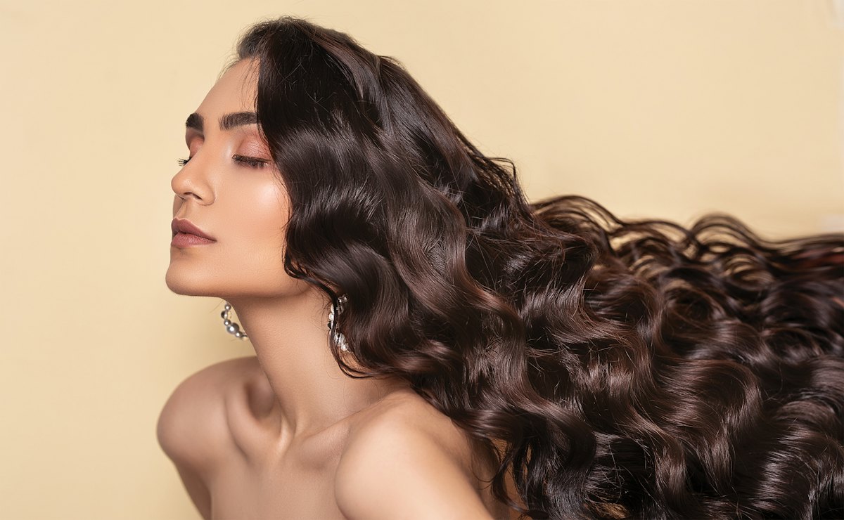 Woman with long curly hair